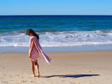 woman on beach with turkish towel portsea blush