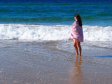 woman on beach with turkish towel portsea blush