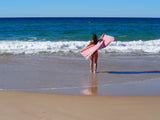 woman on beach with turkish towel portsea cherry