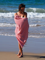 woman on beach with turkish towel portsea cherry