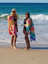 SORRENTO TURKISH COTTON TOWEL - SUNSHINE two women on beach